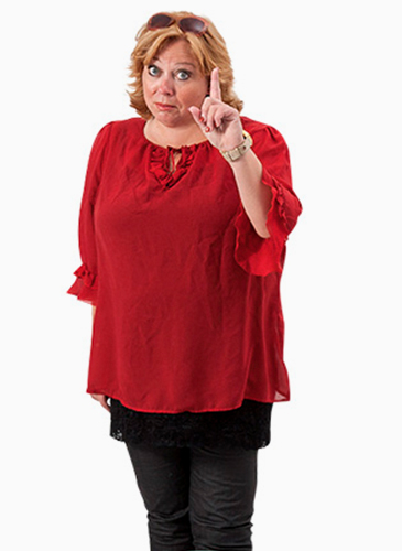 Karen-Marie with raised hand and index finger